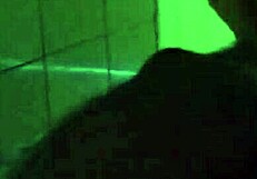 Black woman breastfeeding a young girl