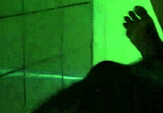 Black woman breastfeeding a young girl