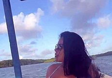 Brazilian latina wife enjoys a relaxing boat ride in bikini