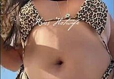 Married wife shows off juicy ass at beach