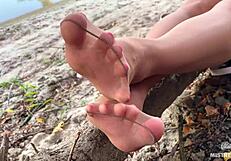 i tease my lover with cute feet in nude tights by the river