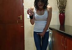 A lovely girl peed in her jeans and then began to smoke