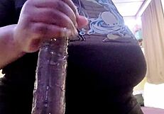 Curvy beauty with big natural tits plays with toys. Her boyfriend watches her tease on camera.