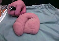 Amateur plays with very soft and limp fake cock in homemade fetish video, no audio.