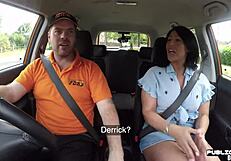 British babe rides instructor in public car lesson