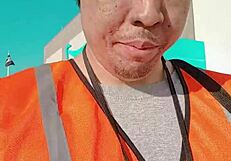 Asian Walking About During Work