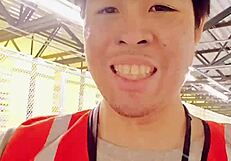 Asian Walking About During Work