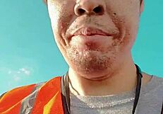 Asian Walking About During Work