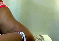 Petite young girl plays with her body