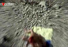 Curvy milf enjoys beach activities in public