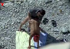 Curvy milf enjoys beach activities in public