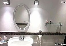 Blonde woman in restraint experiences unusual activity