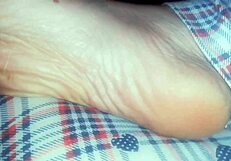 Nicoletta's bare feet ache after a long, dirty day