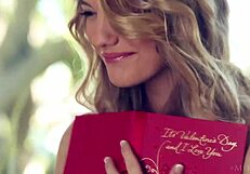 Beautiful teen Kenna James performs a solo striptease.