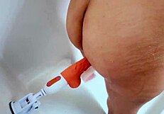 Latina wife caught masturbating in the shower with a big dildo on her wet pussy