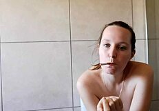 Why is this cute girl smoking in the bathroom?