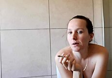 Why is this cute girl smoking in the bathroom?