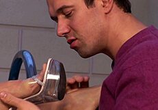 Does the blonde slut tease with her feet?