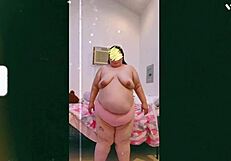 Mature Old Cougar Dances Topless, Showing Off Saggy Tits for the Camera