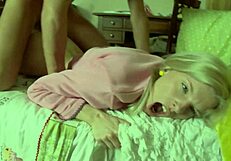 Blonde teen with shaved pussy gets fingered and assfucked in fishnets