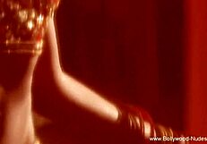 brunette indian girl dances nude to music.