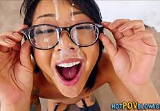 Inked asian petite sucks huge monster cock for facial