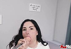 brunette bitch masturbates to orgasm with a selfie stick, her small tits shaved