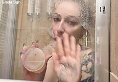 Yo, this redhead teen’s shower play with toys is pure fire! 🔥
