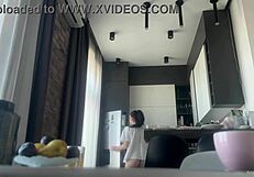 Why does the sexy fit brunette do housework without panties, flashing her shaved pussy and big ass?