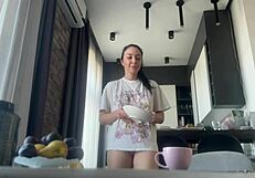 Why does the sexy fit brunette do housework without panties, flashing her shaved pussy and big ass?