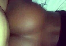 Black couple engages in intense doggystyle backshots, bending over for deep penetration