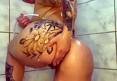 watched this tattooed brazilian housewife dance then play with her small tits and ass under shower 😏