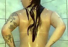 watched this tattooed brazilian housewife dance then play with her small tits and ass under shower 😏