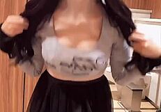 Watch this busty shemale masturbate quietly