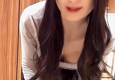 Watch this busty shemale masturbate quietly