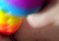 brunette amateur uses rainbow dildo for anal gaping creampie!
