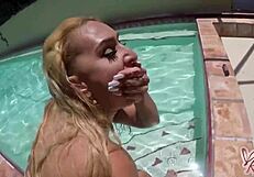 Blonde nina kayy rides her huge dildo by the pool
