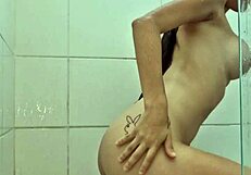 young brunette flashes tits and gapes ass in homemade bath solo