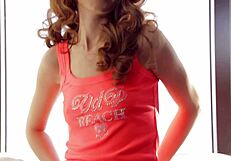 Curly young doll feels excited fingering herself for neighbors.