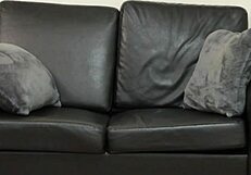 Samantha, a blonde American milf, undergoes casting on sofa.