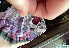 I observe slow motion of fresh tattoo skin peel.