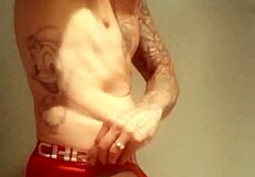 Feeling the thrill of solo pleasure in the shower with a massive cock.