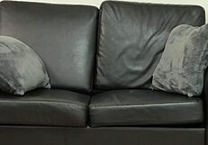 Samantha, a blonde American milf, undergoes casting on sofa.