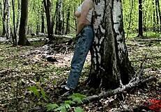 Beautiful girl orgasms from fingering in forest