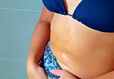 Wow, tanned latina girls shower off after beach fun!