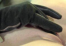 indian milf indulges in gloves fetish masturbation, building to a climax in her desires.