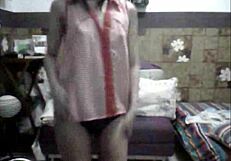 Asian Filipina's teasing striptease with ripped clothes and small tits