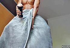 Latino sexy guy fucks fleshlight at the window, cumming inside with big cock.