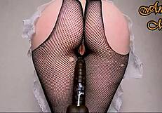 pawg in sexy clothes and latex gloves enjoys dildo play