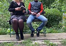 Curvy step mother satisfies step son outdoors with handjob